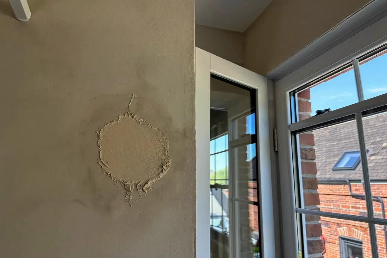 A freshly plastered window reveal after new windows were fitted